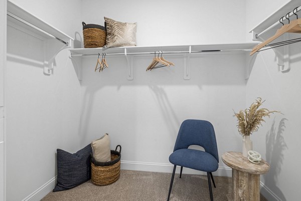 Walk-in closet with custom shelving at Banyan Silo Ridge Apartments, offering ample storage space in our luxury apartment community