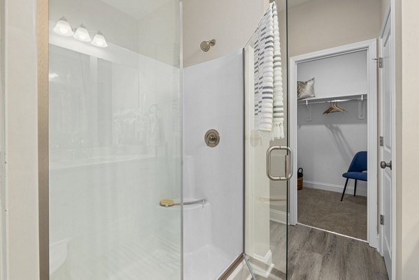 Banyan Silo Ridge Apartments: Luxurious bathroom featuring sleek countertops and modern fixtures