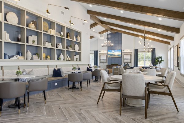 Clubhouse featuring modern design and seating at Banyan Silo Ridge Apartments, perfect for social gatherings and community events