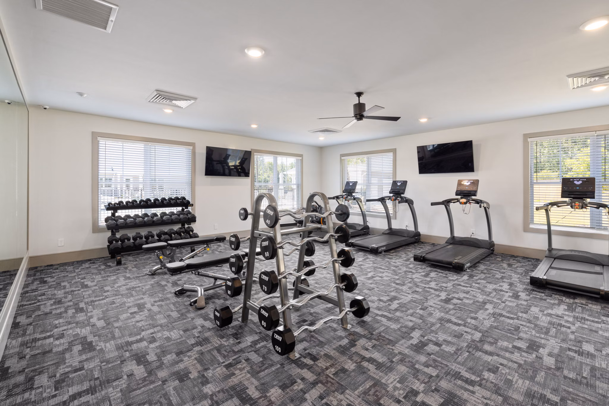 State-of-the-art fitness center with modern equipment at Banyan Silo Ridge Apartments