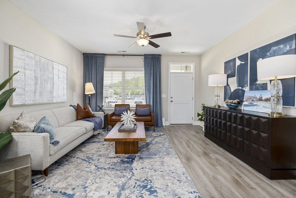Modern living room with sleek furniture at Banyan Silo Ridge Apartments