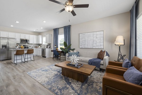 Modern living room with sleek furnishings in Banyan Silo Ridge Apartments