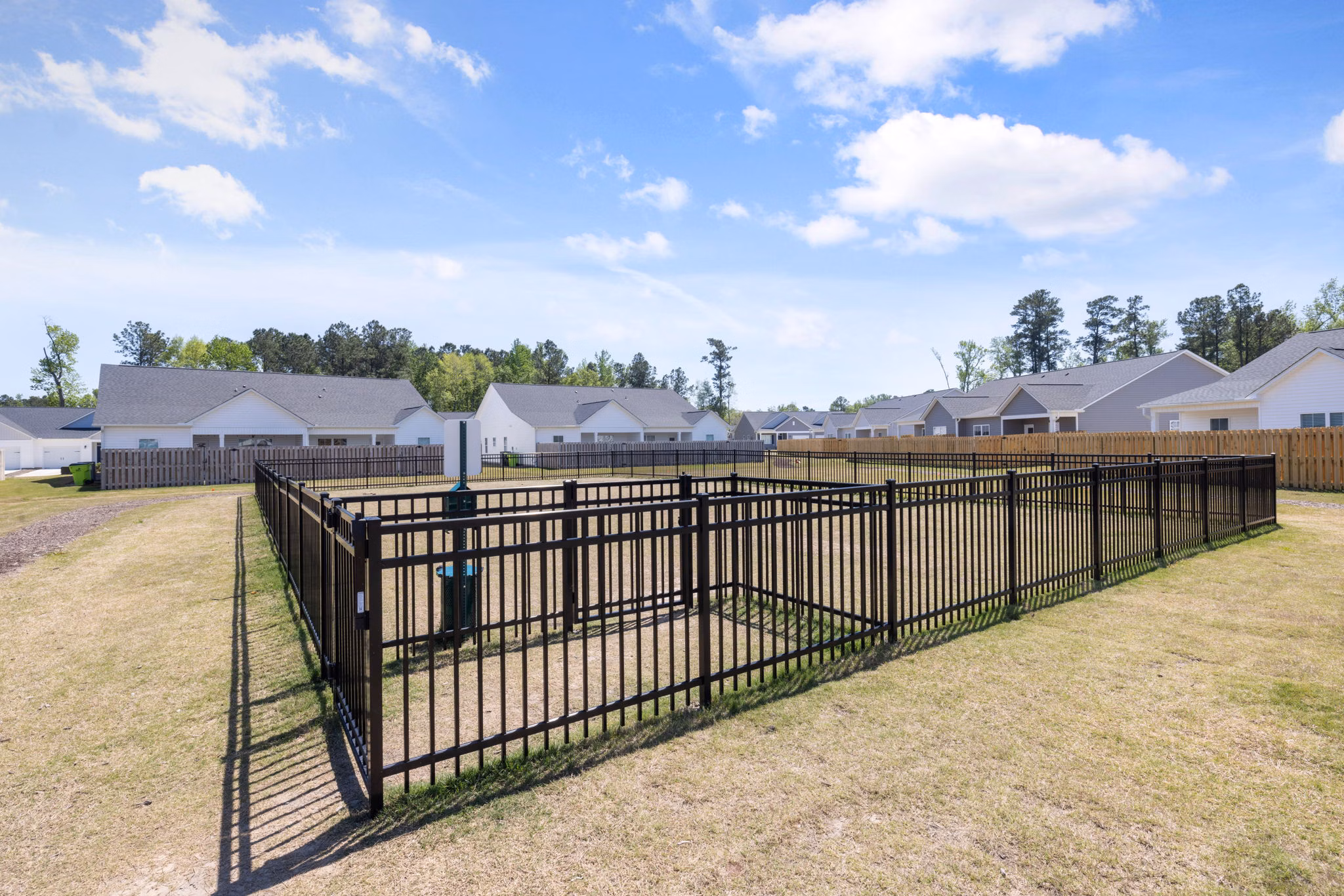 Dog-friendly park with agility equipment at Banyan Silo Ridge Apartments