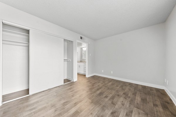 Stylish bedroom with modern decor at Verve Apartments: luxury living in a Greystar-managed community