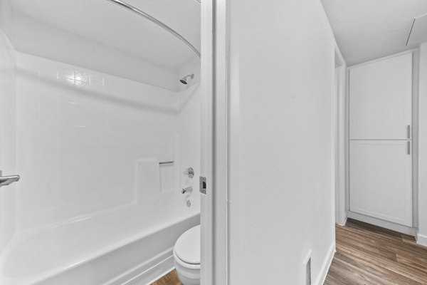 Contemporary bathroom with sleek fixtures at Verve Apartments, featuring luxury amenities