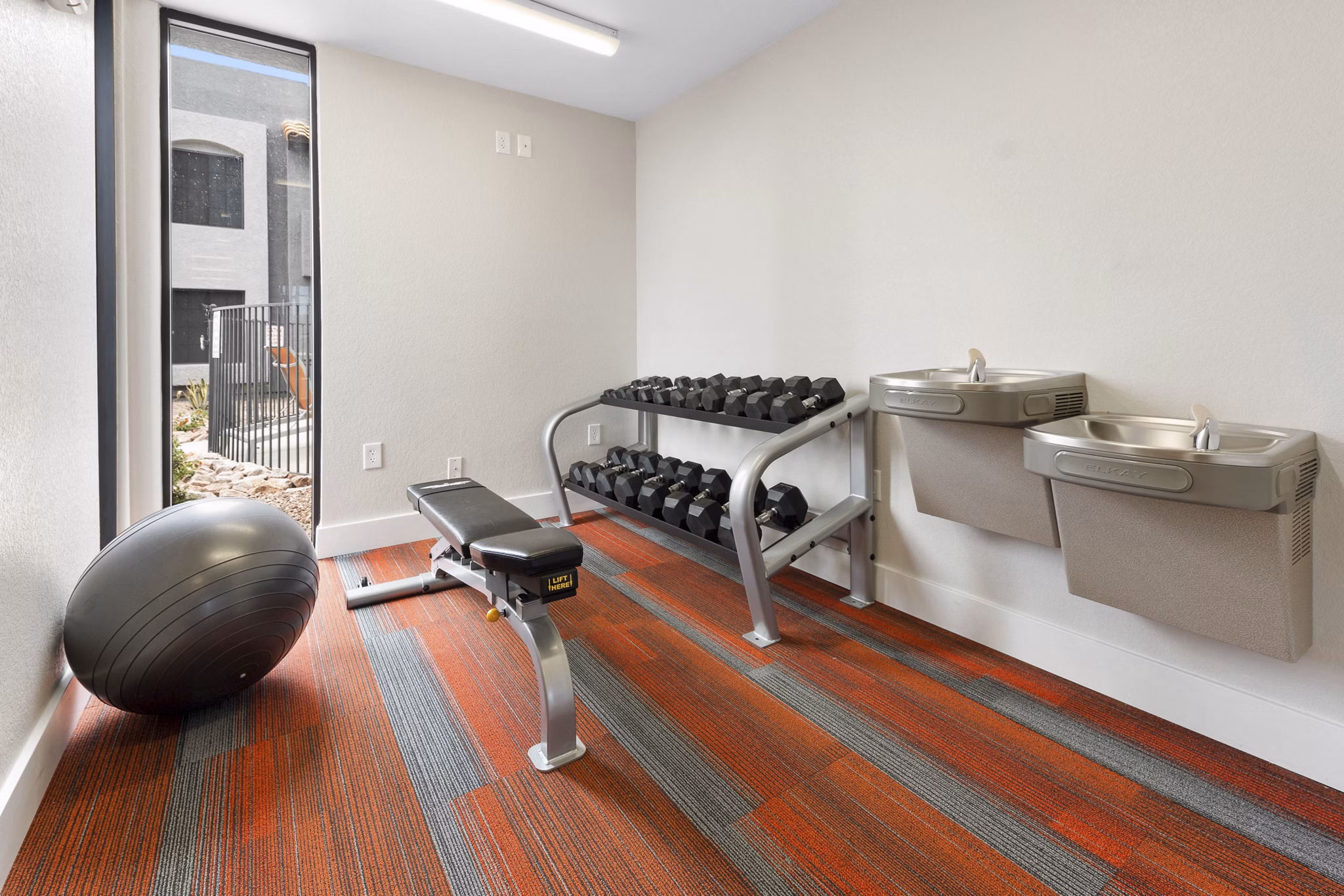 State-of-the-art fitness center with modern equipment at Verve Apartments, ideal for luxury urban living