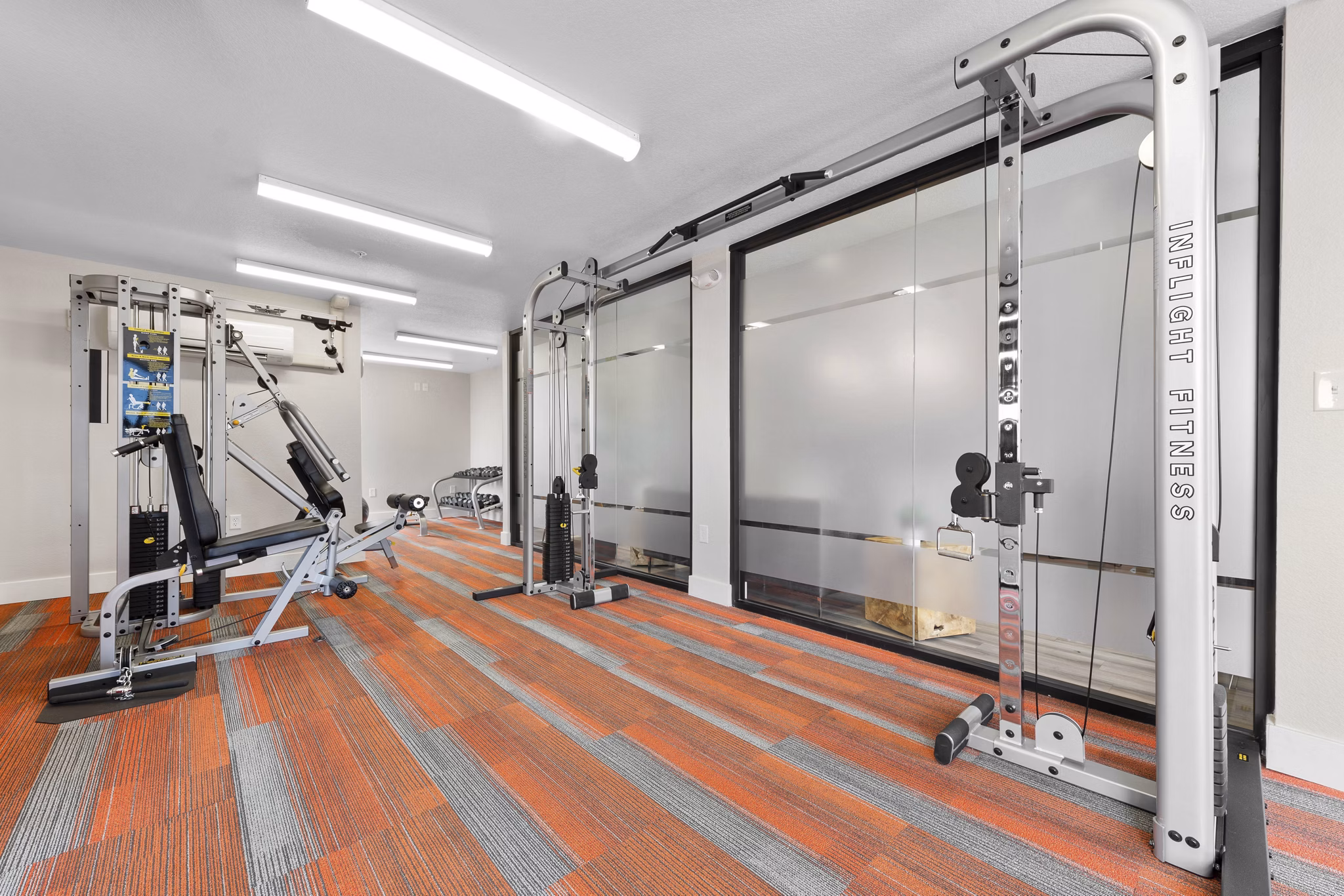 State-of-the-art fitness center equipped with modern machines at Verve Apartments, perfect for an active lifestyle