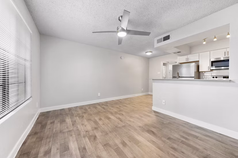 Modern kitchen with sleek countertops and stainless steel appliances at Verve Apartments