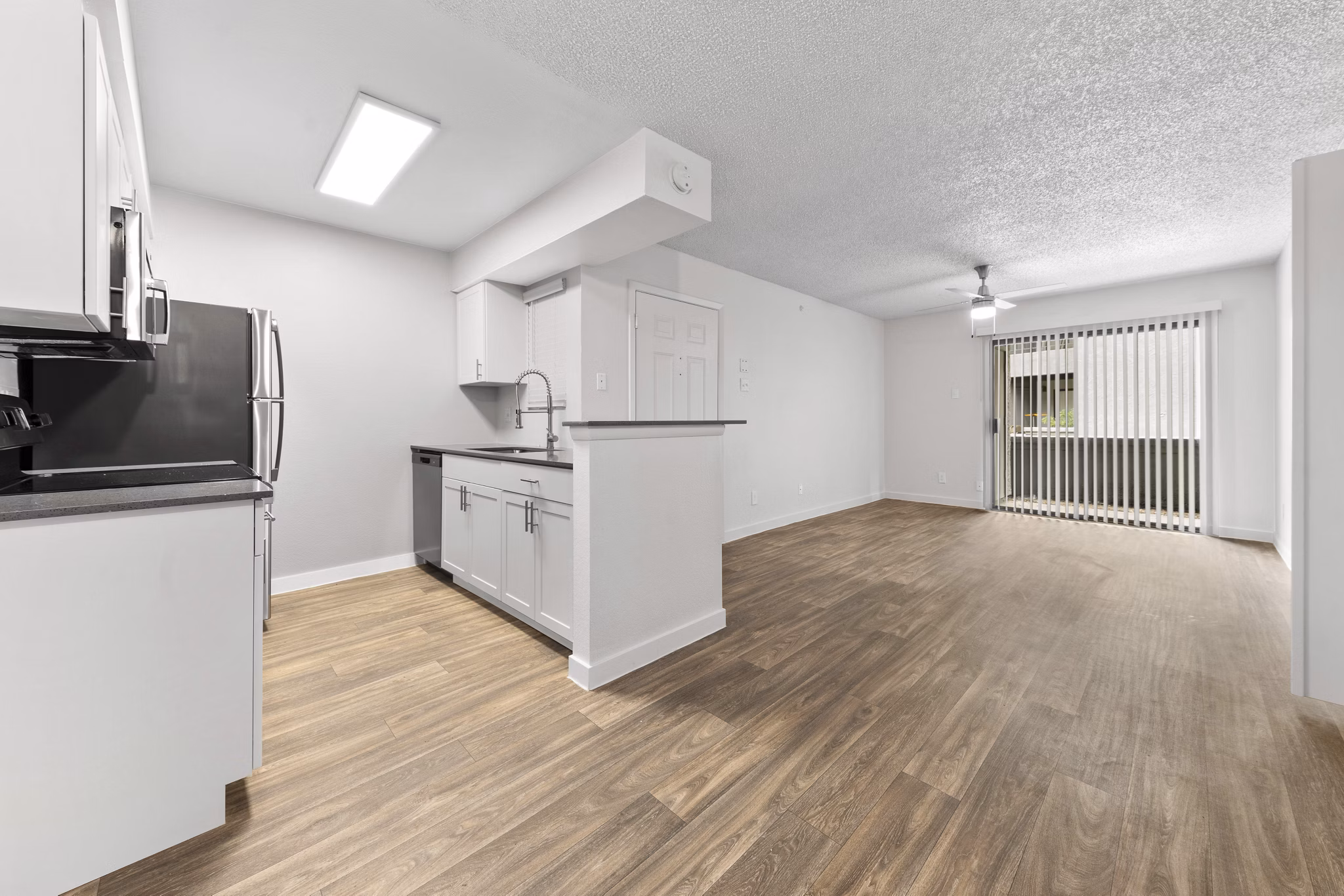 Modern kitchen with stainless steel appliances at Verve Apartments