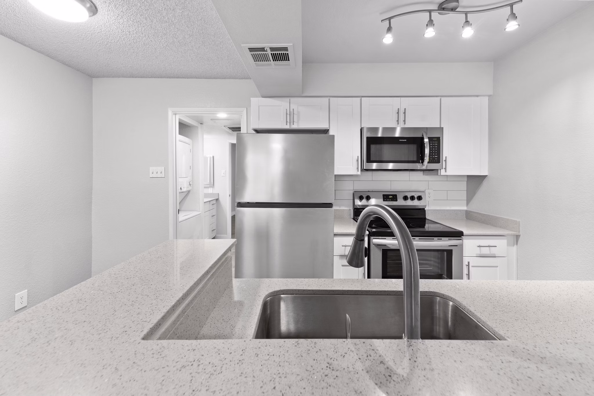 Spacious kitchen with modern appliances at Verve Apartments