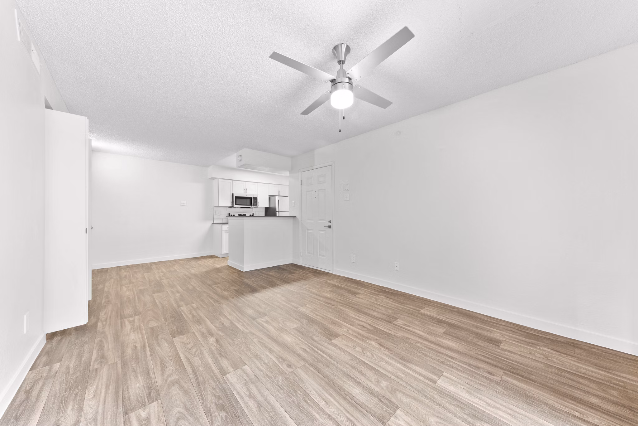 Modern living room with stylish furnishings at Verve Apartments, a luxury Greystar property