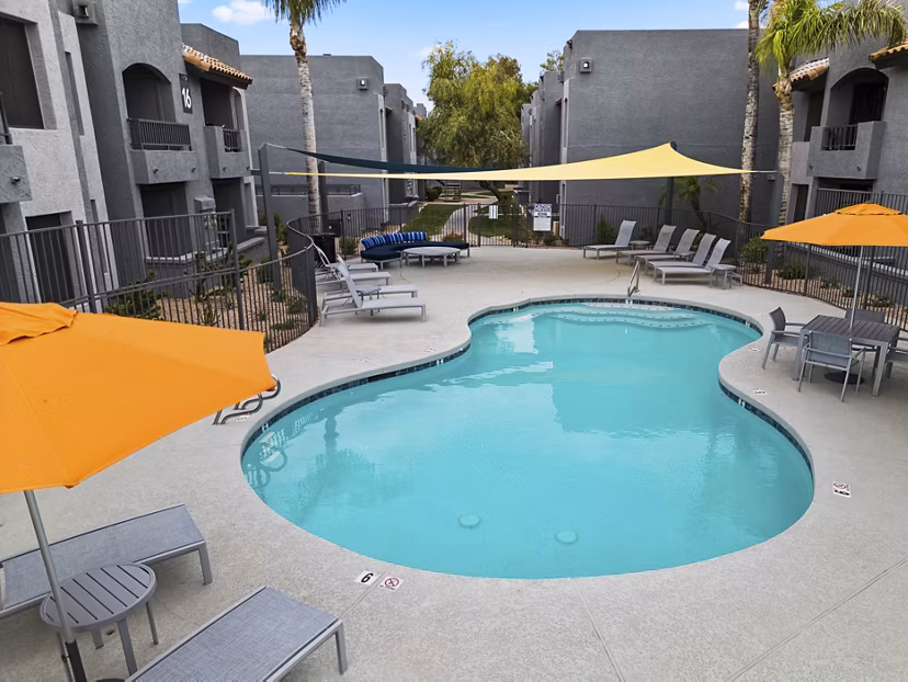Sparkling outdoor pool at Verve Apartments, luxury living by Greystar in a vibrant urban setting