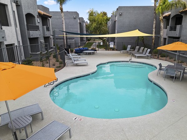Sparkling outdoor pool at Verve Apartments, luxury living by Greystar in a vibrant urban setting