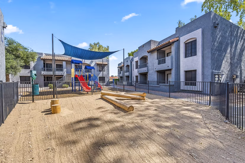 Dog park and children's playground at Verve Apartments offering vibrant outdoor activities and recreation spaces for residents