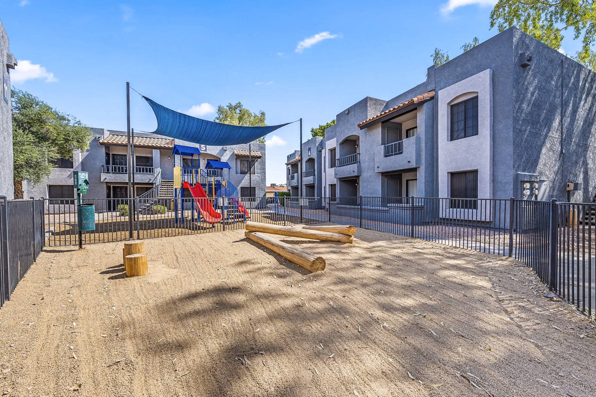 Dog park and children's playground at Verve Apartments offering vibrant outdoor activities and recreation spaces for residents
