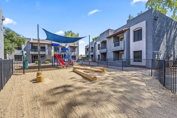 Dog park and children's playground at Verve Apartments offering vibrant outdoor activities and recreation spaces for residents