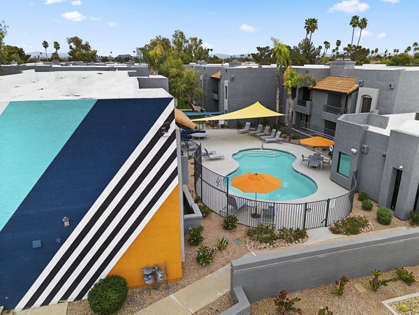 City view from Verve Apartments' rooftop at night showcasing luxury living in downtown