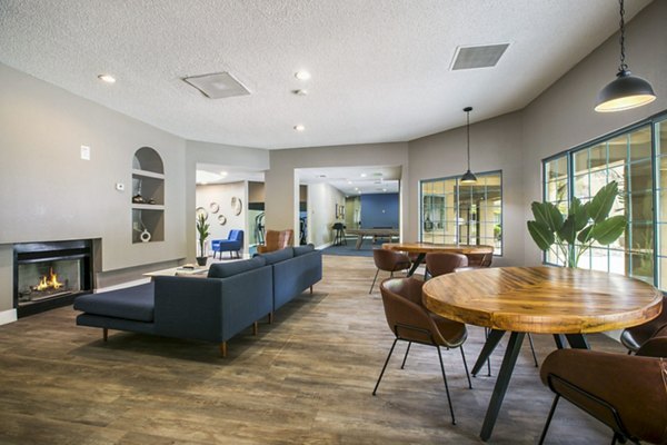 Clubhouse with modern furnishings at Cinnamon Tree Apartments Perfect for resident gatherings and community events