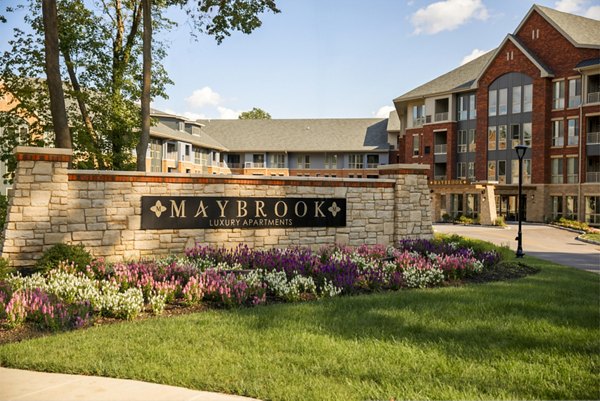 Maybrook Luxury Apartments: Elegant apartment complex with landscaped gardens in front