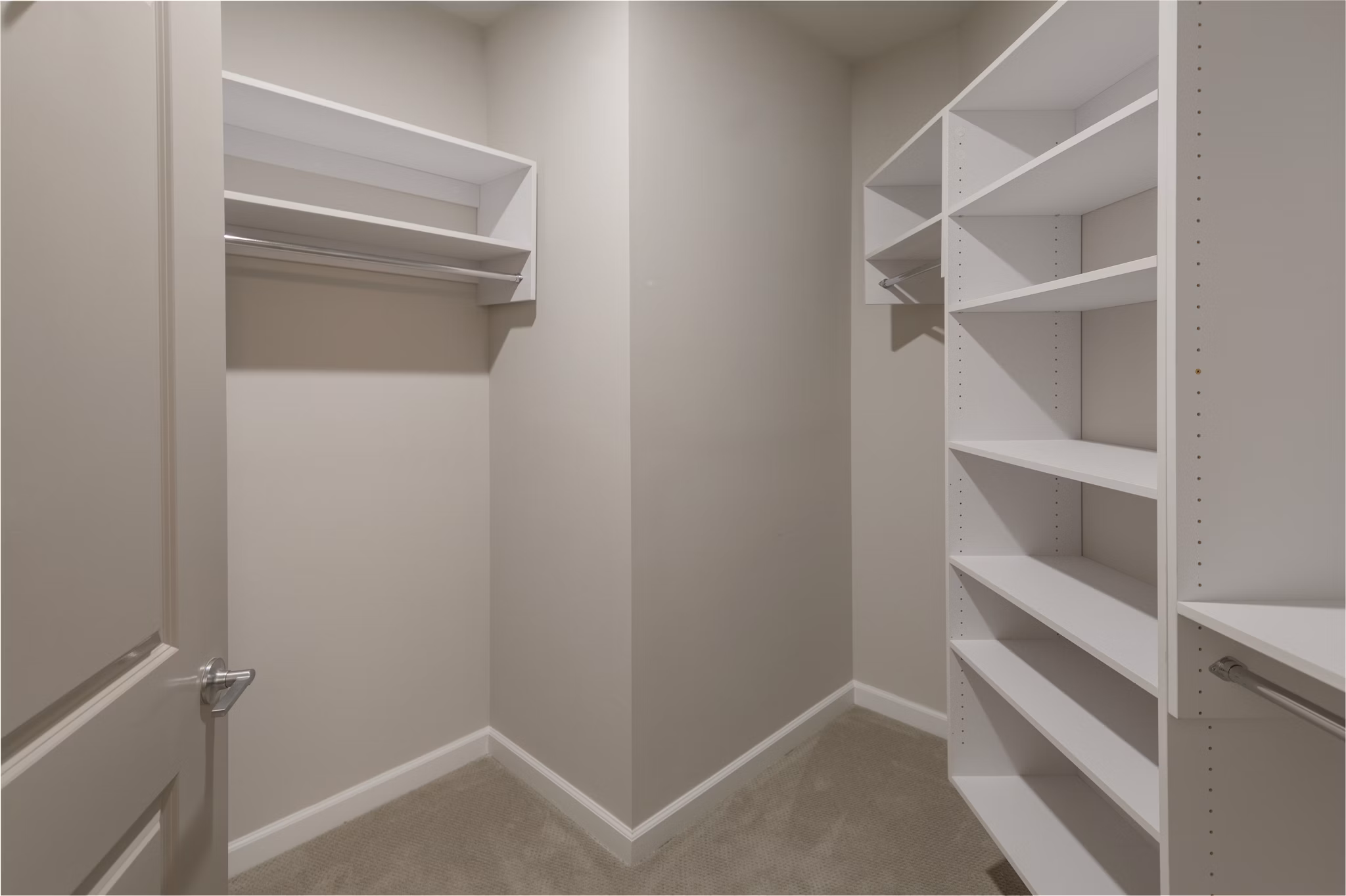 Walk-in closet with ample shelving and hanging space at Maybrook Apartments, offering modern storage solutions for luxury living