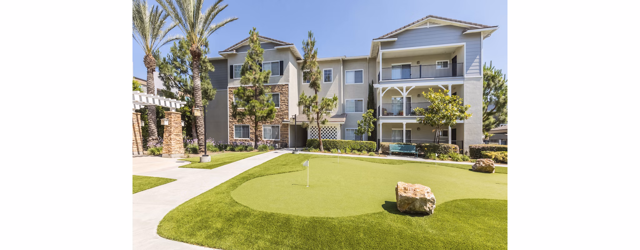 The Village on 5th Apartments: with putting practice green, luxury apartment community