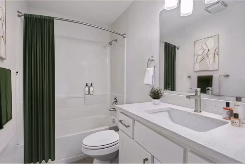 Bathroom featuring modern fixtures and elegant tilework at Lakeview at Newcastle Apartments
