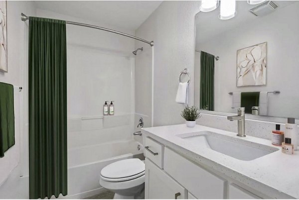 Bathroom featuring modern fixtures and elegant tilework at Lakeview at Newcastle Apartments