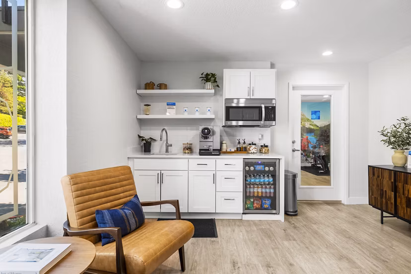 Clubhouse featuring modern lounge spaces and entertainment areas at Lakeview at Newcastle Apartments in this image from Greystar luxury apartments