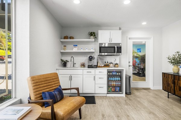 Clubhouse featuring modern lounge spaces and entertainment areas at Lakeview at Newcastle Apartments in this image from Greystar luxury apartments