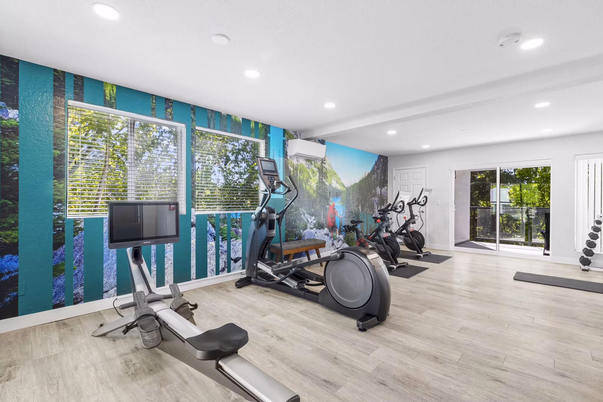 State-of-the-art fitness center at Lakeview at Newcastle Apartments featuring modern equipment and expansive workout space