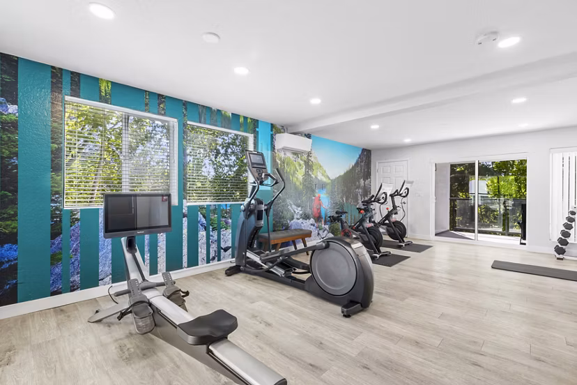 State-of-the-art fitness center at Lakeview at Newcastle Apartments featuring modern equipment and expansive workout space