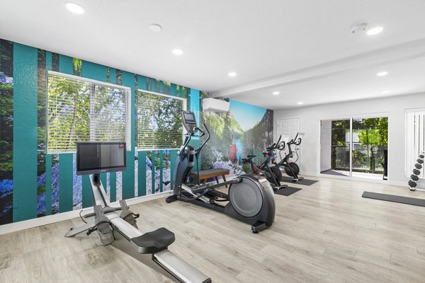 State-of-the-art fitness center at Lakeview at Newcastle Apartments featuring modern equipment and expansive workout space