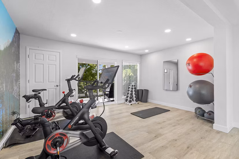 Modern fitness center with state-of-the-art equipment at Lakeview at Newcastle Apartments