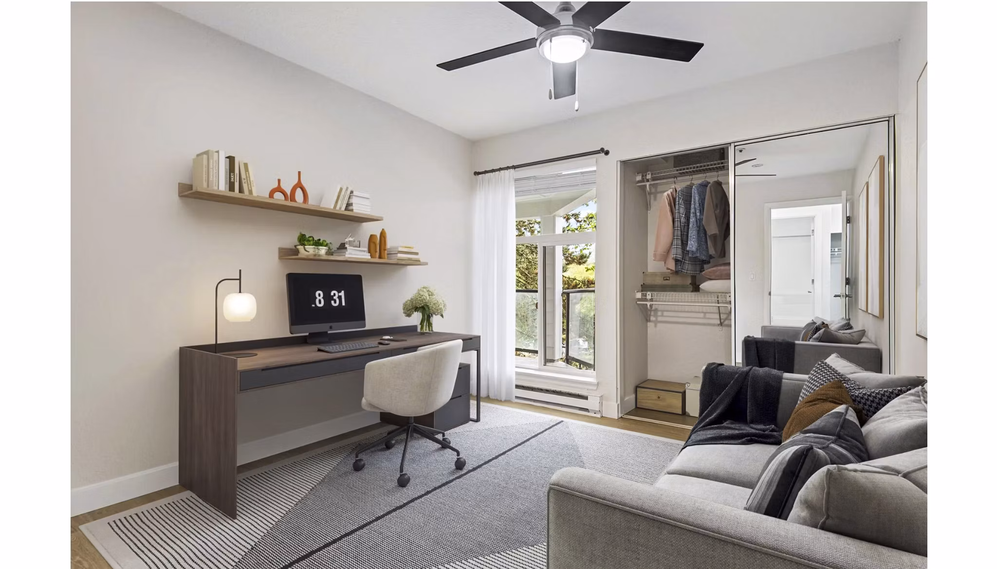Cozy living room with home office setup at Lakeview at Newcastle Apartments, ideal for remote work and comfort