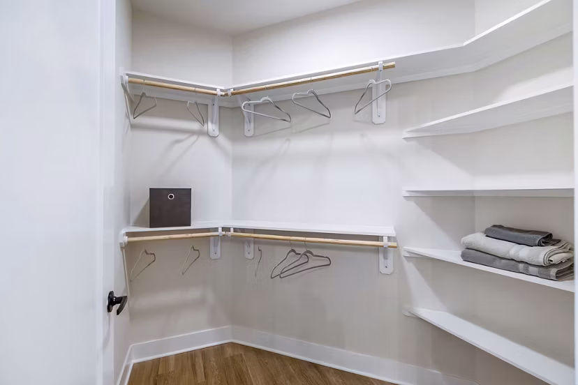 Bedroom closet with ample storage at Elan Harvest Green Apartments in luxury setting