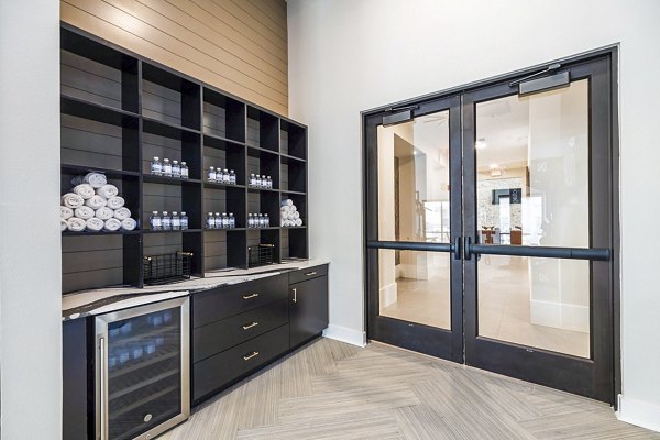 State-of-the-art fitness center with modern equipment at Elan Harvest Green Apartments