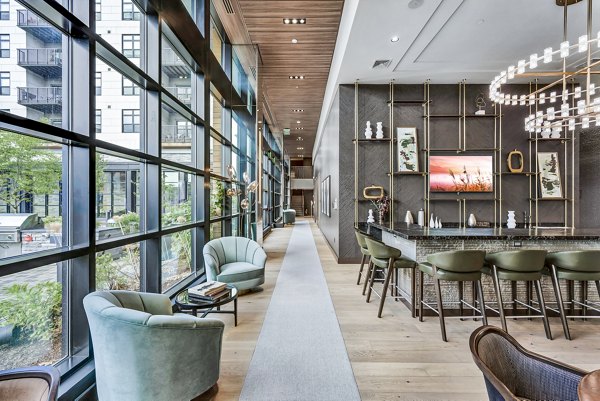 Modern clubhouse featuring sleek design elements at Avenu at Natick Apartments