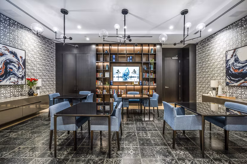 Elegant dining room featuring contemporary decor and ample seating at Avenu at Natick Apartments clubhouse