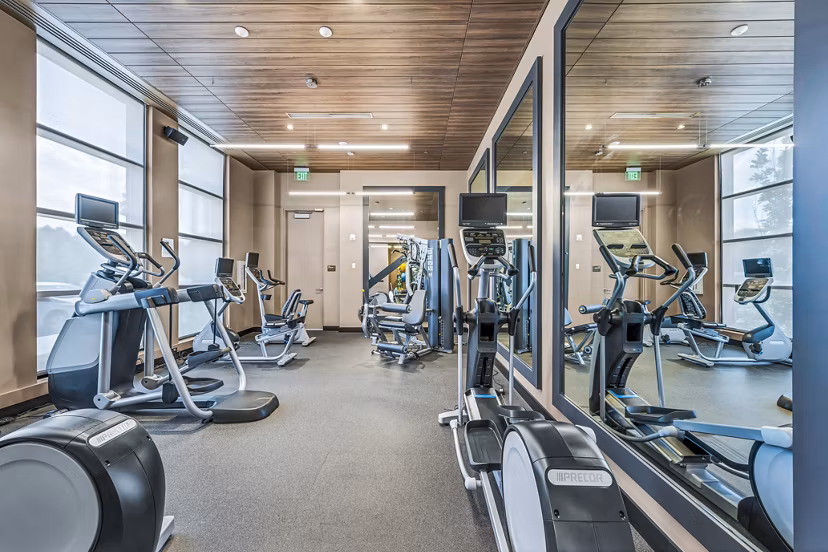 State-of-the-art fitness center at Avenu at Natick Apartments featuring modern gym equipment