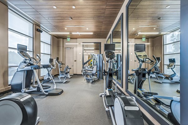 State-of-the-art fitness center at Avenu at Natick Apartments featuring modern gym equipment