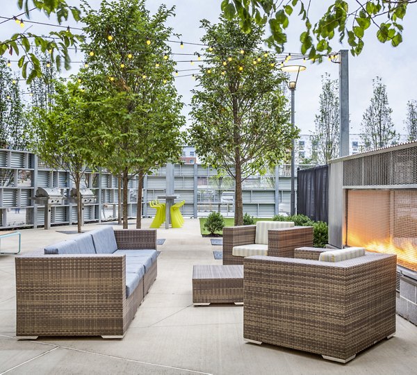 Cozy fire pit on the patio at One North of Boston Apartments