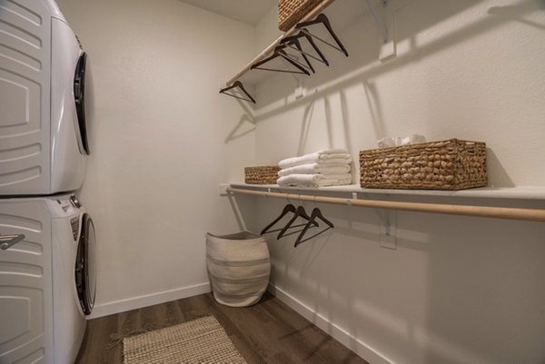 Walk-in closet with ample storage at Allaso Journal Center Apartments