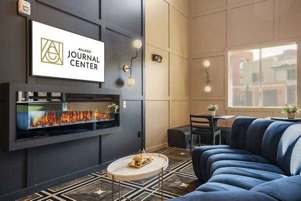 Clubhouse with modern design and comfortable seating at Allaso Journal Center Apartments in Albuquerque