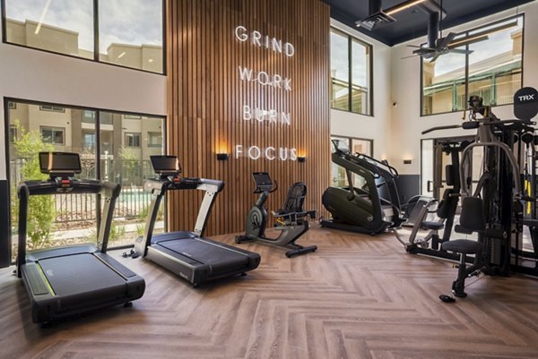 Modern fitness center with state-of-the-art equipment at Allaso Journal Center Apartments, ideal for a luxury lifestyle and wellness