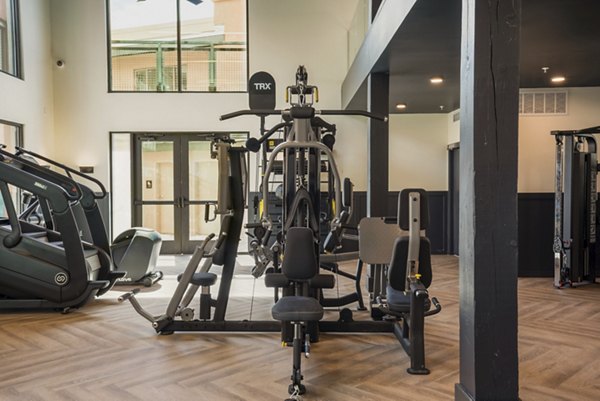 State-of-the-art fitness center with modern equipment at Allaso Journal Center Apartments