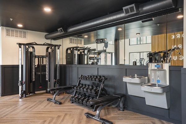 State-of-the-art fitness center at Allaso Journal Center Apartments featuring advanced exercise equipment