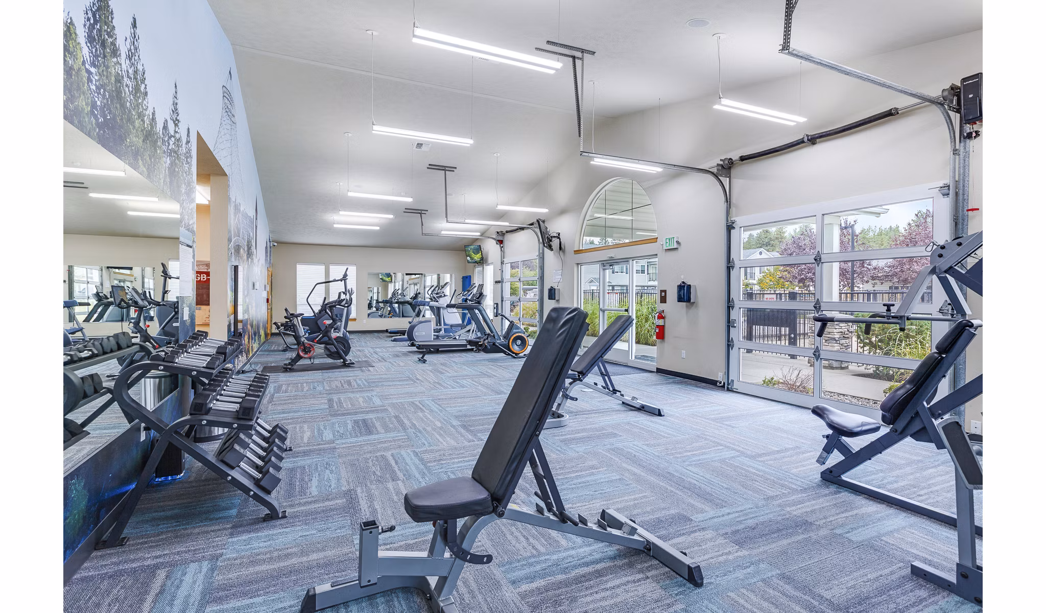 State-of-the-art fitness center with modern equipment at Trillium Apartments