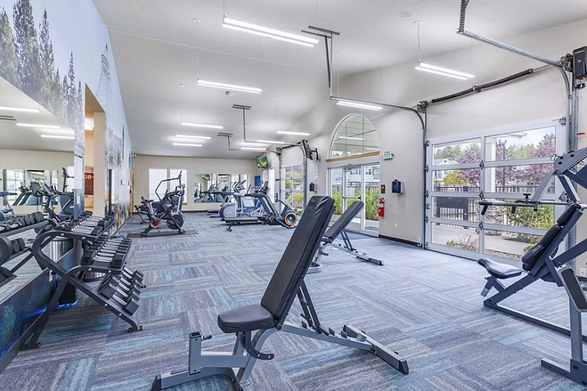 State-of-the-art fitness center with modern equipment at Trillium Apartments