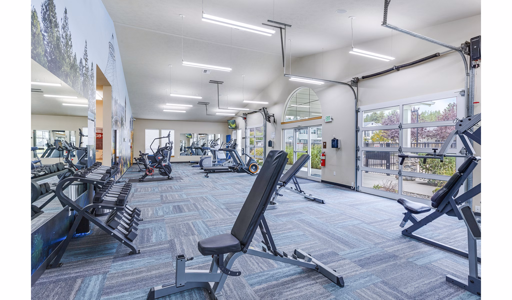 State-of-the-art fitness center with modern equipment at Trillium Apartments