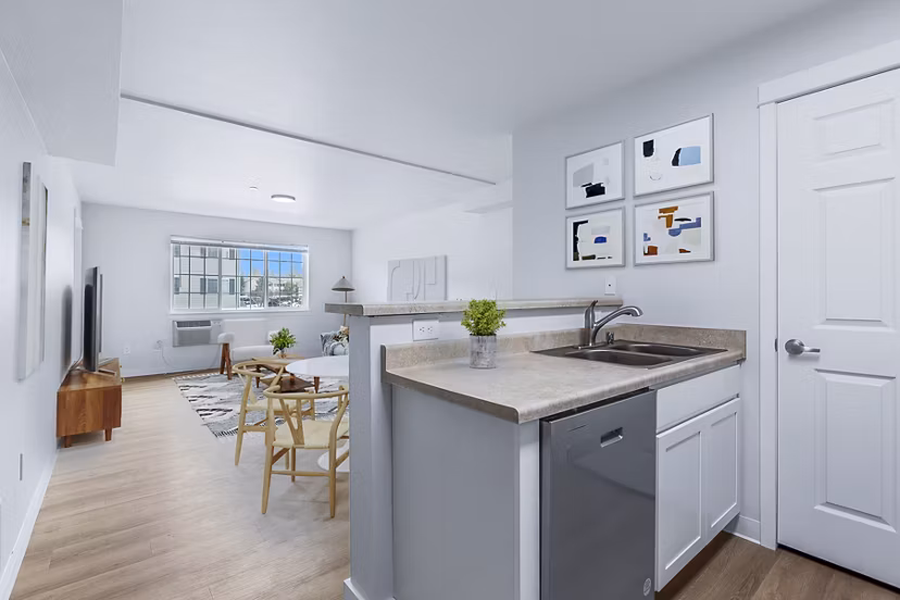 Spacious kitchen featuring stainless steel appliances at Trillium Apartments